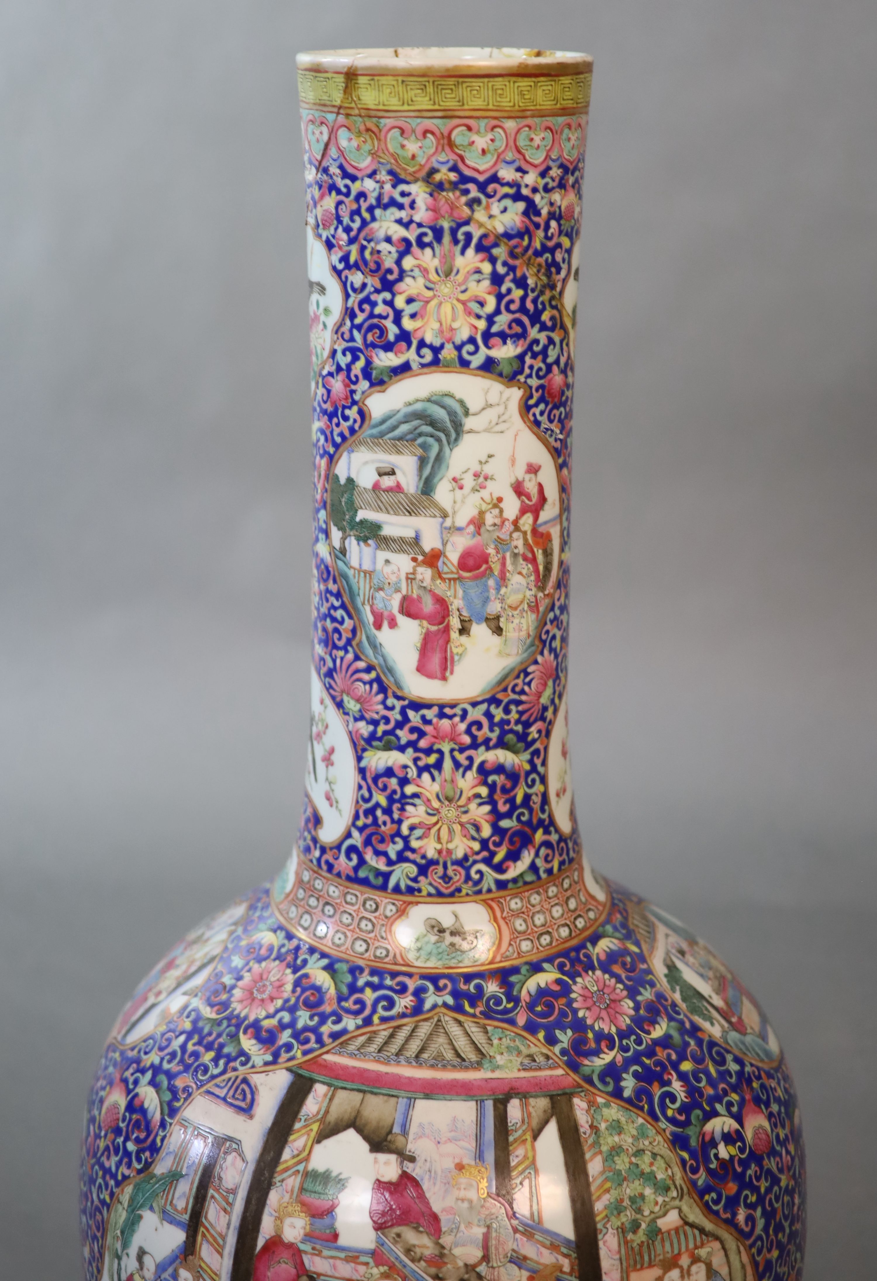 A massive Chinese blue ground bottle vase, Daoguang period (1821-50), 88cm high, neck broken and re-glued